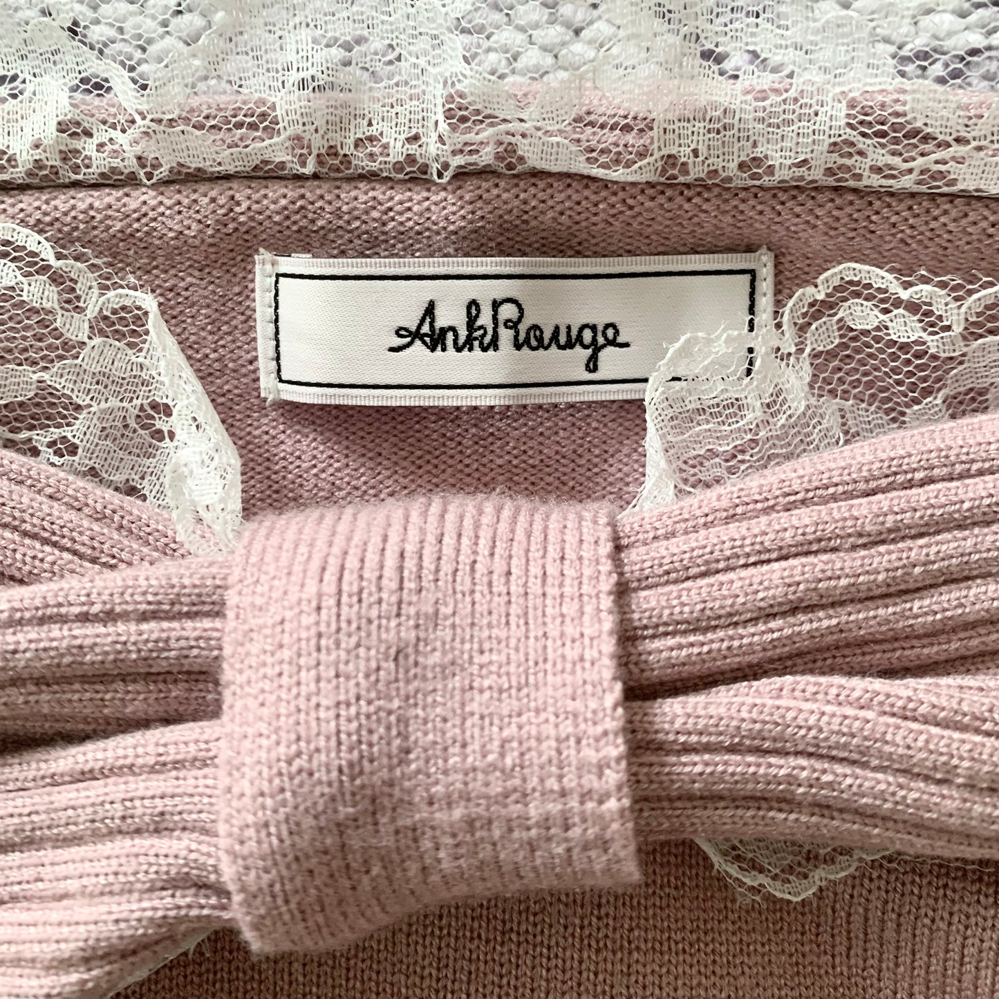 Ank Rouge open shoulder bow sweater