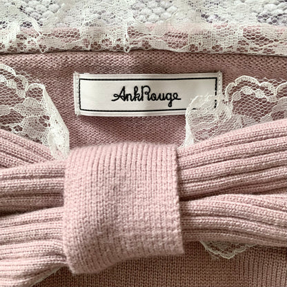 Ank Rouge open shoulder bow sweater